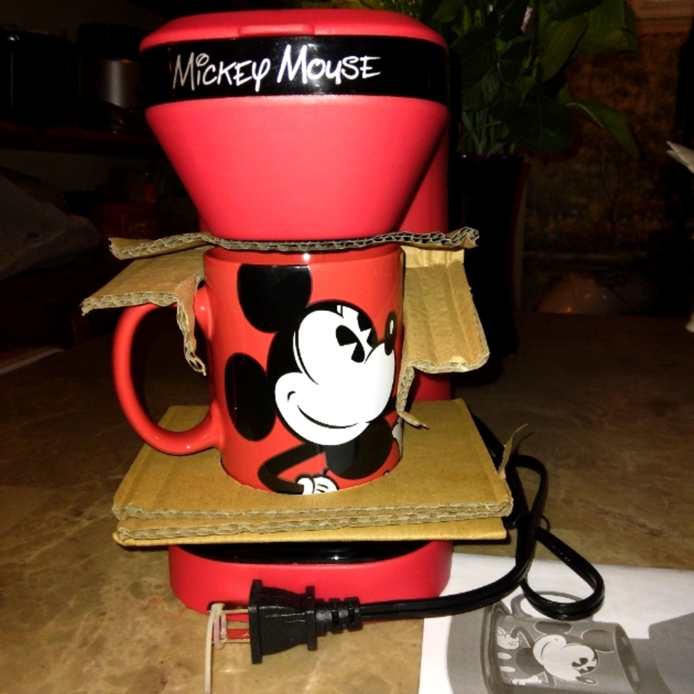 SOLD.....New Disney One 12 Oz. Coffee Maker